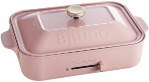 BRUNO compact hot plate (pink) include a basic flat pan and a multi- purpose pan
